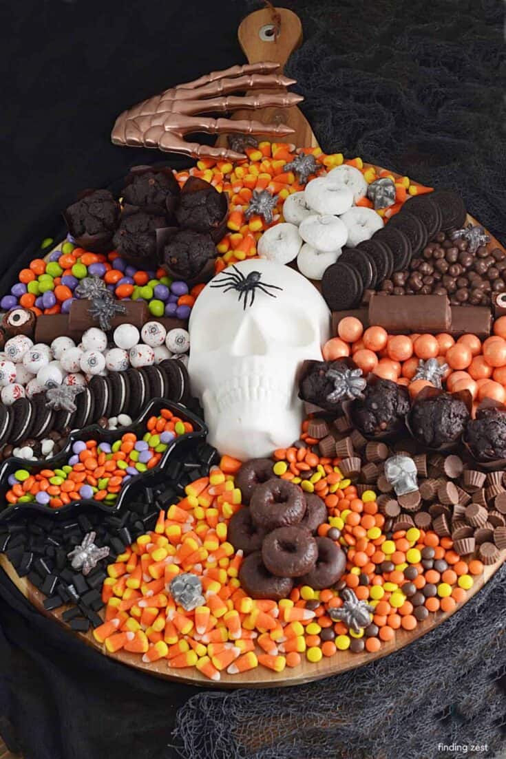 Grinning Skull Dessert Spread: A Candy-Covered Halloween Centerpiece