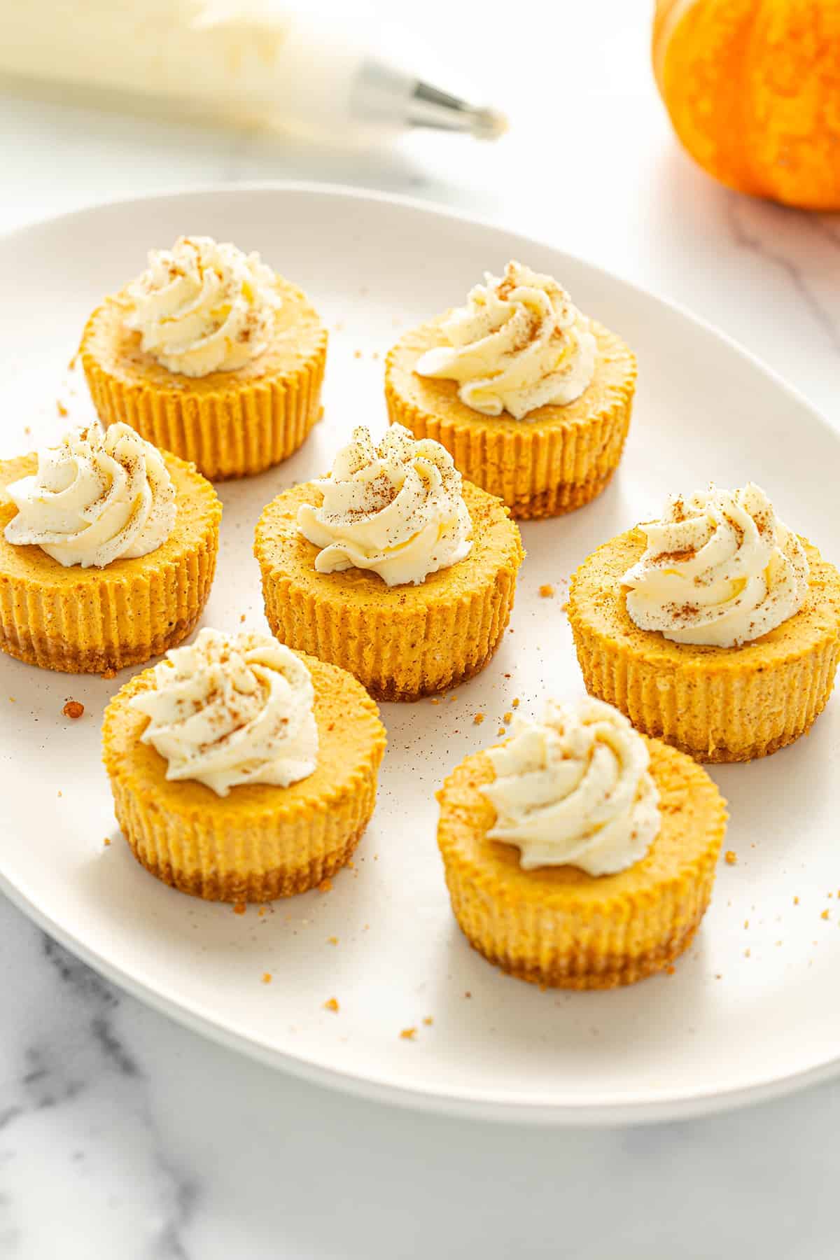 Individually Portioned Autumnal Spice Cheesecake Cups With a Buttery Crust