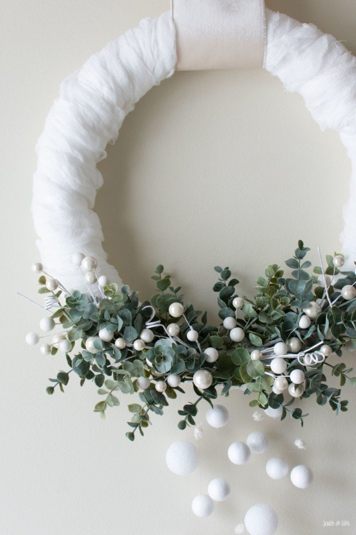 Snowy Wintergreen Wreath with a Pop of Green