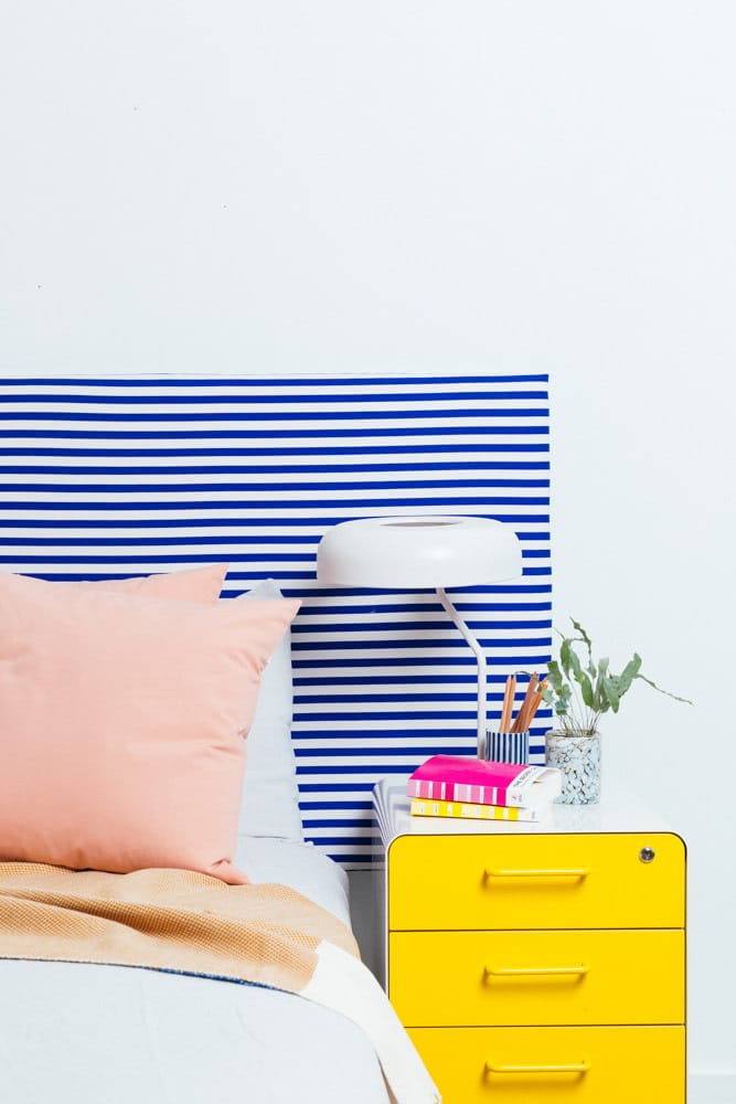Tailored Striped Fabric Headboard from an IKEA Tabletop