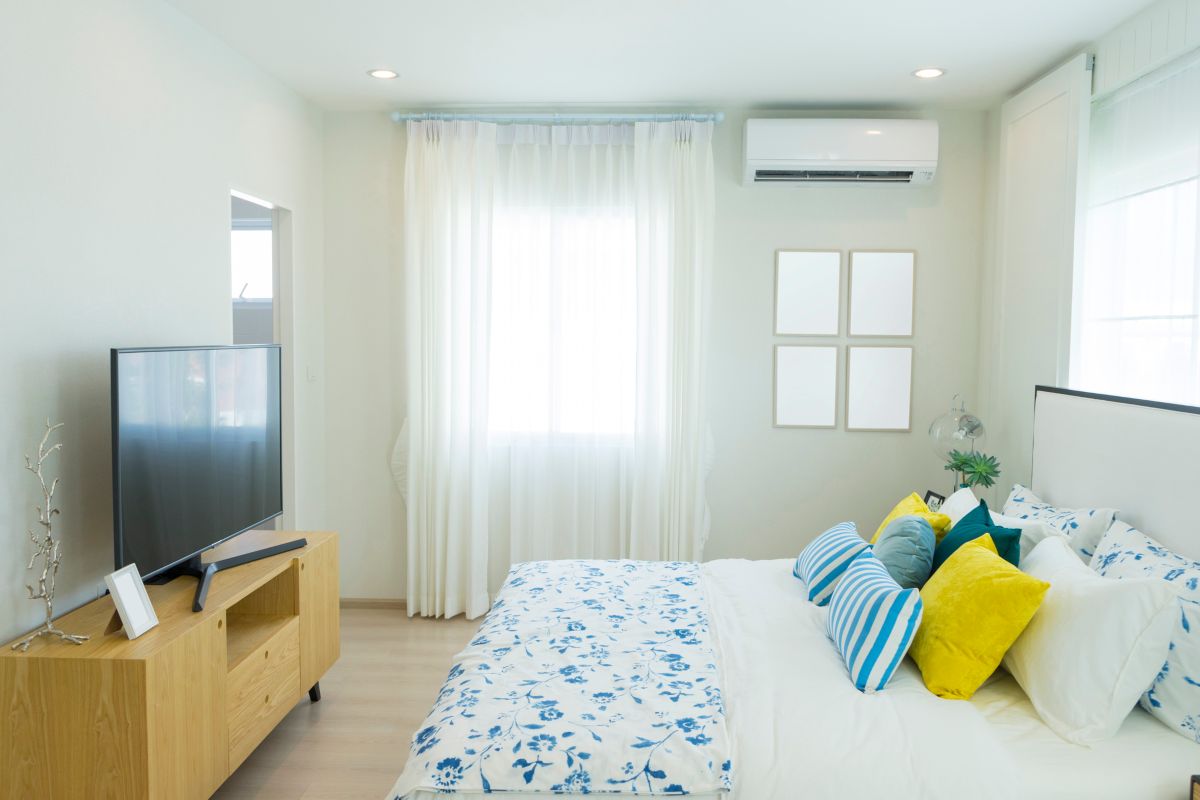 Bold Patterned Bedding to Rescue an All-White Room