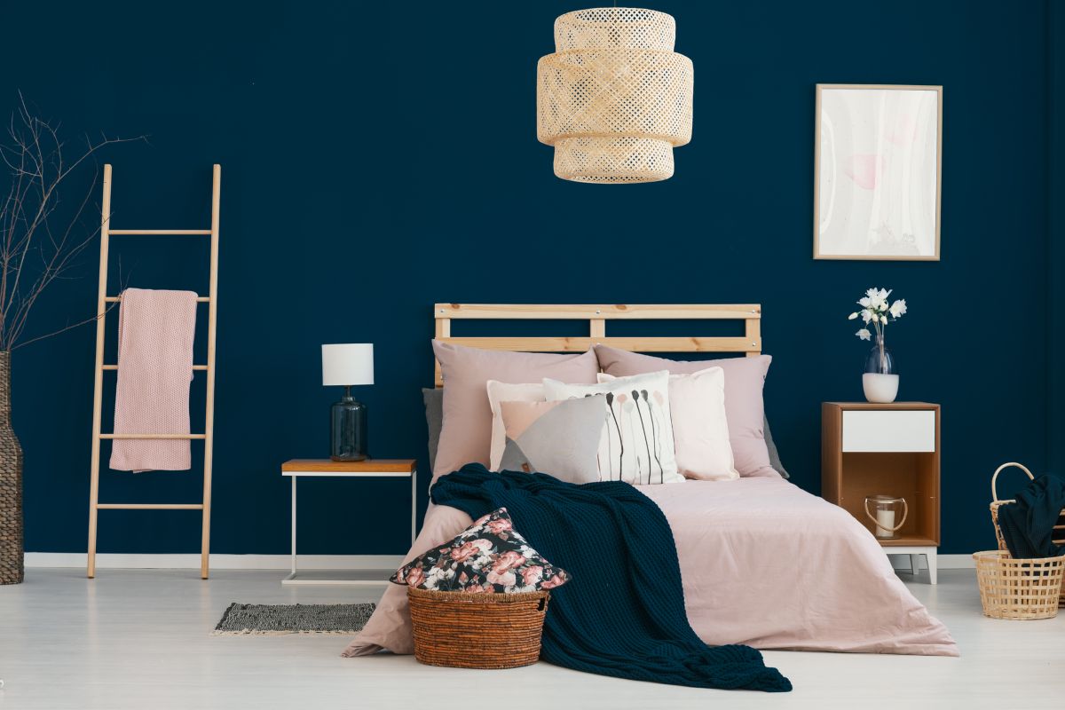 Navy Walls Paired with Soft Pink and Mauve Accents