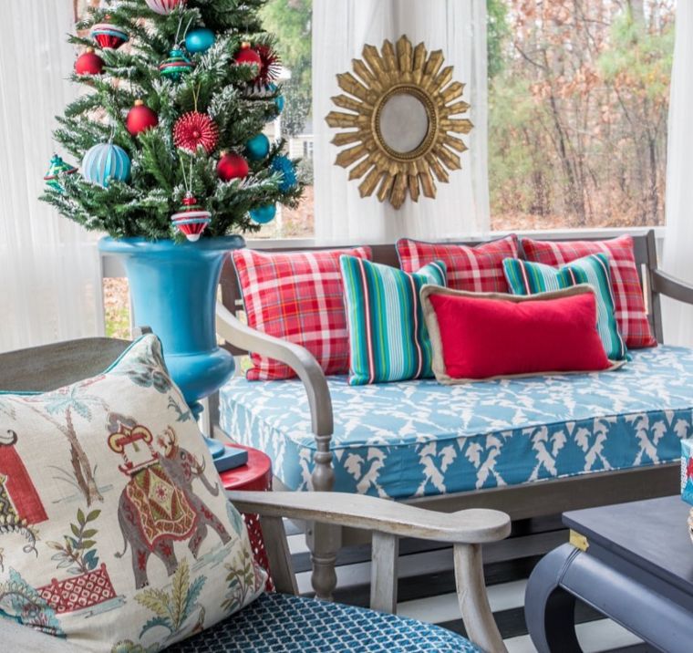 Jewel Tones Meet Plush Comfort: A Porch That Invites You to Linger