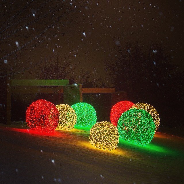 Orbital Cheer: Spherical Bushes Dressed for Christmas
