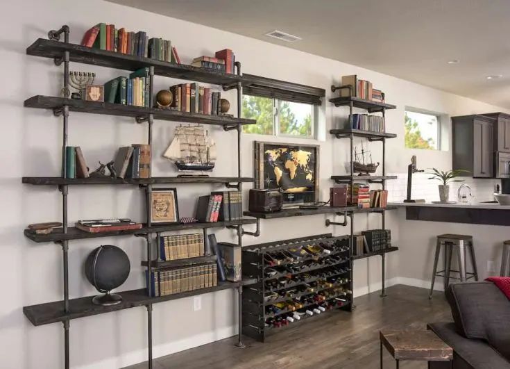 Industrial Pipe Shelves with Mid‑Century Warmth