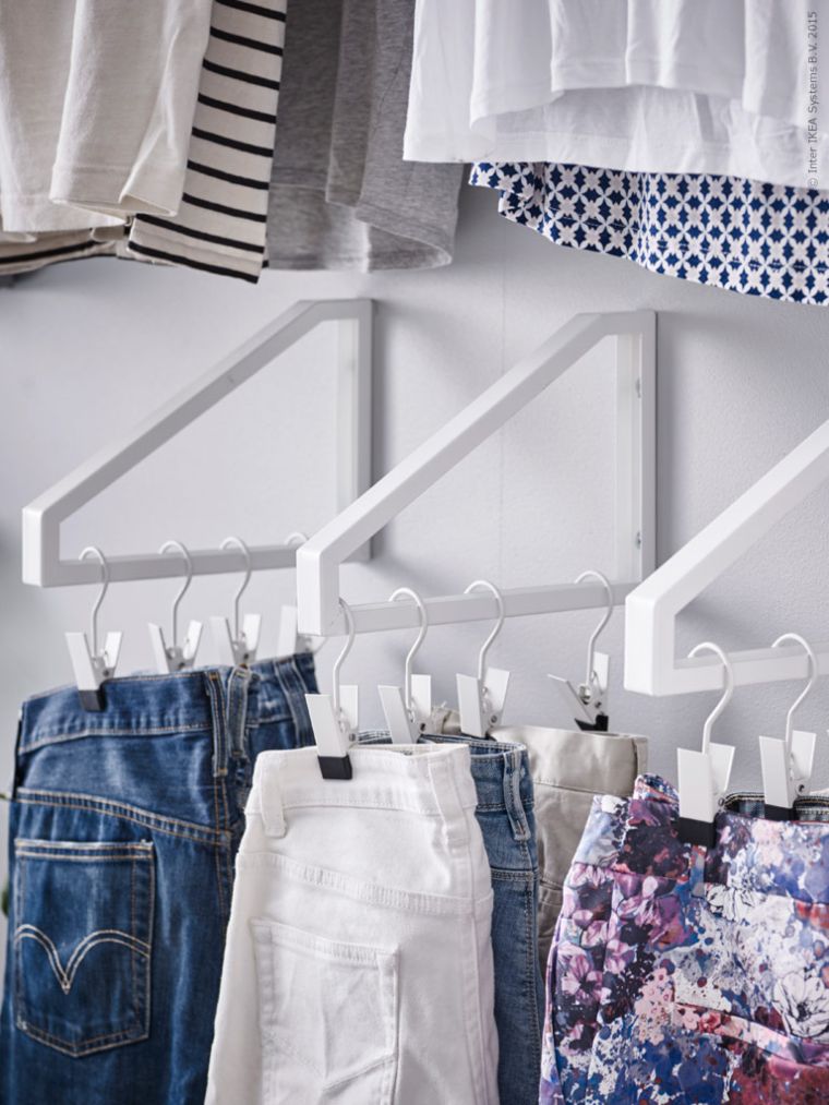 Create Extra Hanging Space Using IKEA Shelf Brackets as Clothing Rails