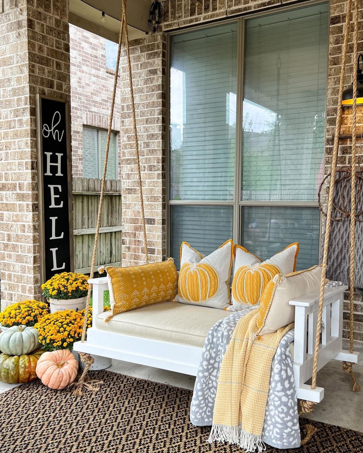 Snuggle Up on a Fall-Ready Porch Swing