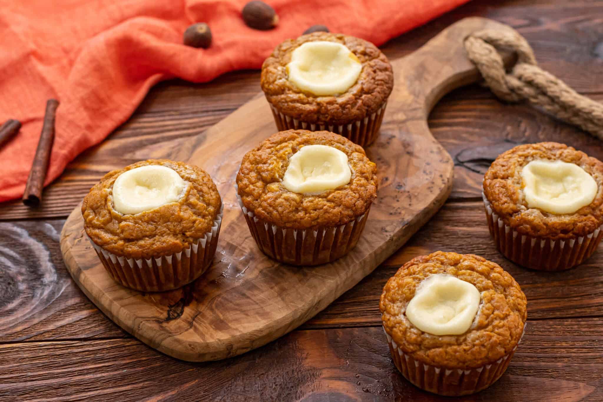 Spiced Harvest Muffins With a Velvet Cream Cheese Center