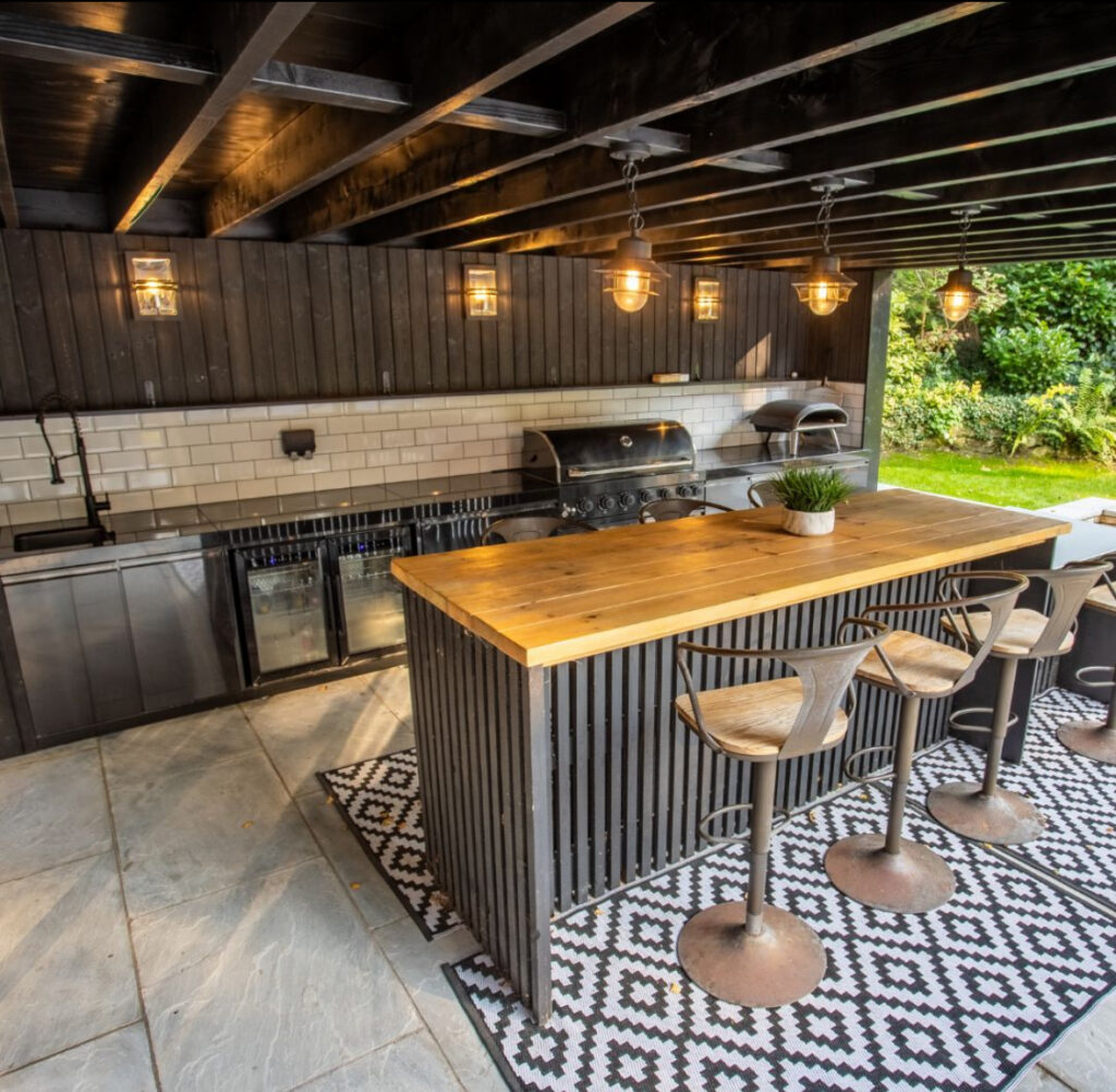 Set a Dramatic Timber Bar Against Patterned Rugs