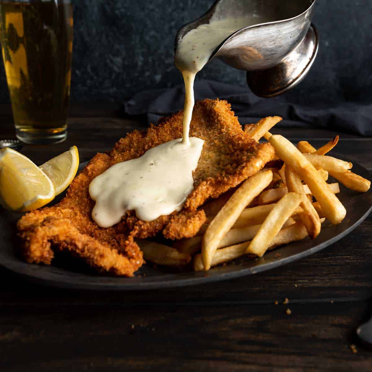 Golden Breaded Pork Schnitzel with Alpine Gruyère Sauce