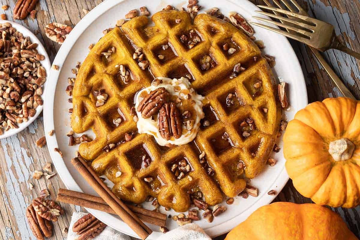 Crispy Pumpkin Waffles Drizzled With Toasted Brown Butter Syrup