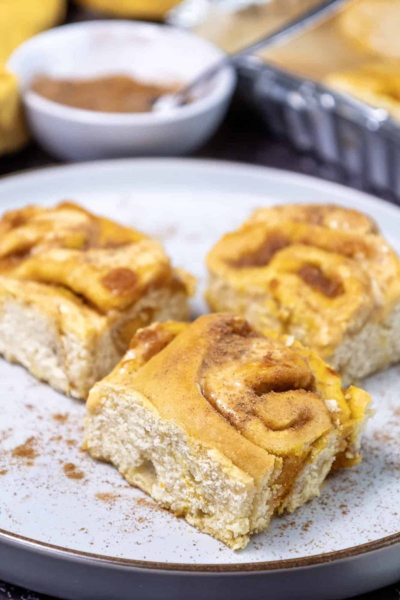 Decadent Spiced Harvest Pastries Drizzled With Rich Cream Glaze