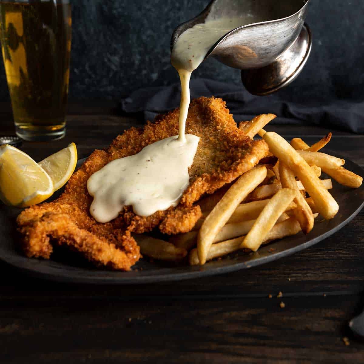 Golden Breaded Pork Schnitzel with Alpine Gruyère Sauce